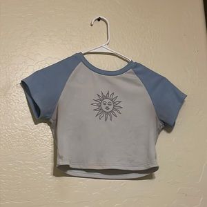Blue and whitish grey baby tee